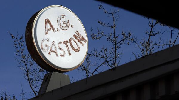 This photo taken Monday, Jan. 9, 2017, shows the sign at the now-abandoned A.G. Gaston Motel in Birmingham, Ala. Once used by The Rev. Martin Luther King Jr., the motel will be renovated as the city's civil rights district joins the National Park Service under a proclamation signed by President Barack Obama on Thursday, Jan. 12. (AP Photo/Jay Reeves)