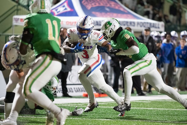 Makari Bodiford, running back for Walton, runs the ball in for a touchddown during the Walton vs. Buford High School Football game on Friday, Nov. 18, 2022, at Buford High School in Buford, Georgia. (Jamie Spaar for the Atlanta Journal Constitution)