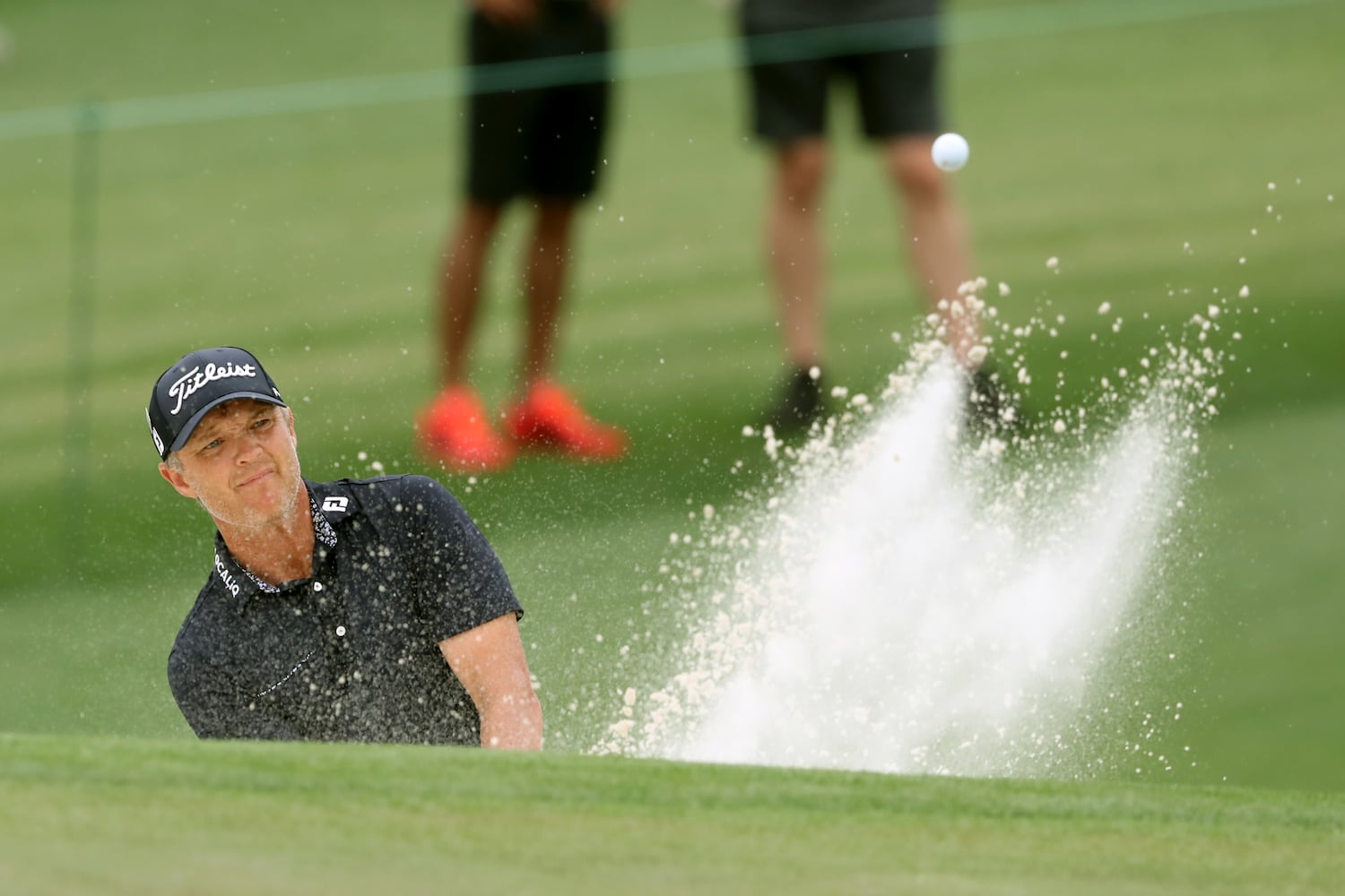 April 10, 2021, Augusta: Matt Jones hits out of the bunker on the second green during the third round of the Masters at Augusta National Golf Club on Saturday, April 10, 2021, in Augusta. Curtis Compton/ccompton@ajc.com