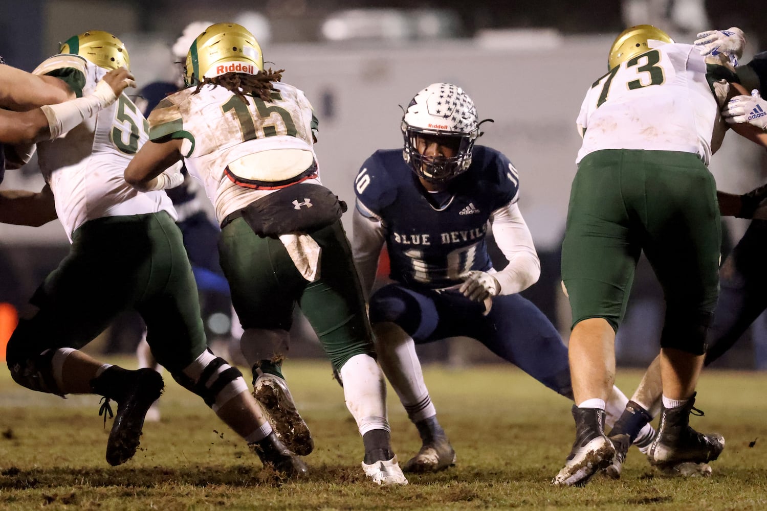 Dec. 18, 2020 - Norcross, Ga: Norcross linebacker Jalen Garner (10) tackles Grayson running back Joseph Taylor (15) in the second half of the Class AAAAAAA semi-final game at Norcross high school Friday, December 18, 2020 in Norcross, Ga.. JASON GETZ FOR THE ATLANTA JOURNAL-CONSTITUTION