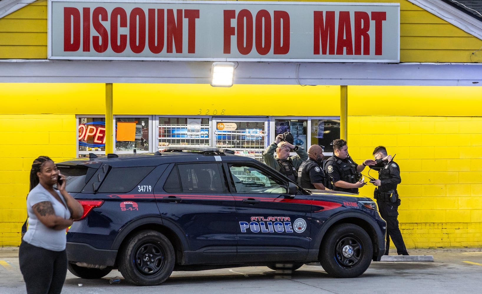 A security guard and his suspected assailant were both shot during the struggle over a gun at the Discount Food Mart on Martin Luther King Jr. Drive in southwest Atlanta the morning of March 15, 2024. 