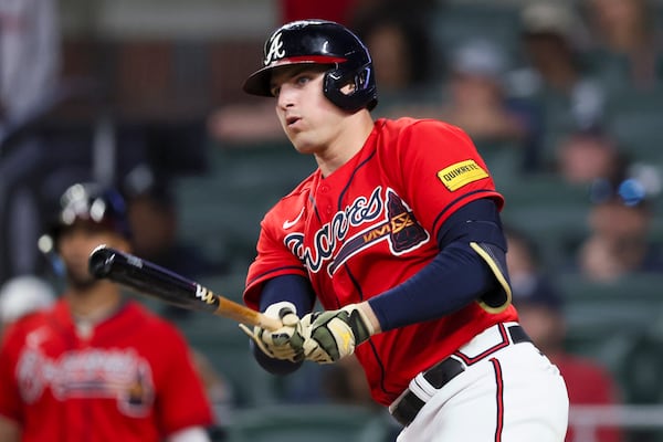 Atlanta Braves’ Austin Riley hits a single during the seventh inning against the Seattle Mariners at Truist Park, Friday, May 19, 2023, in Atlanta. Braves won 6-2. (Jason Getz / Jason.Getz@ajc.com)