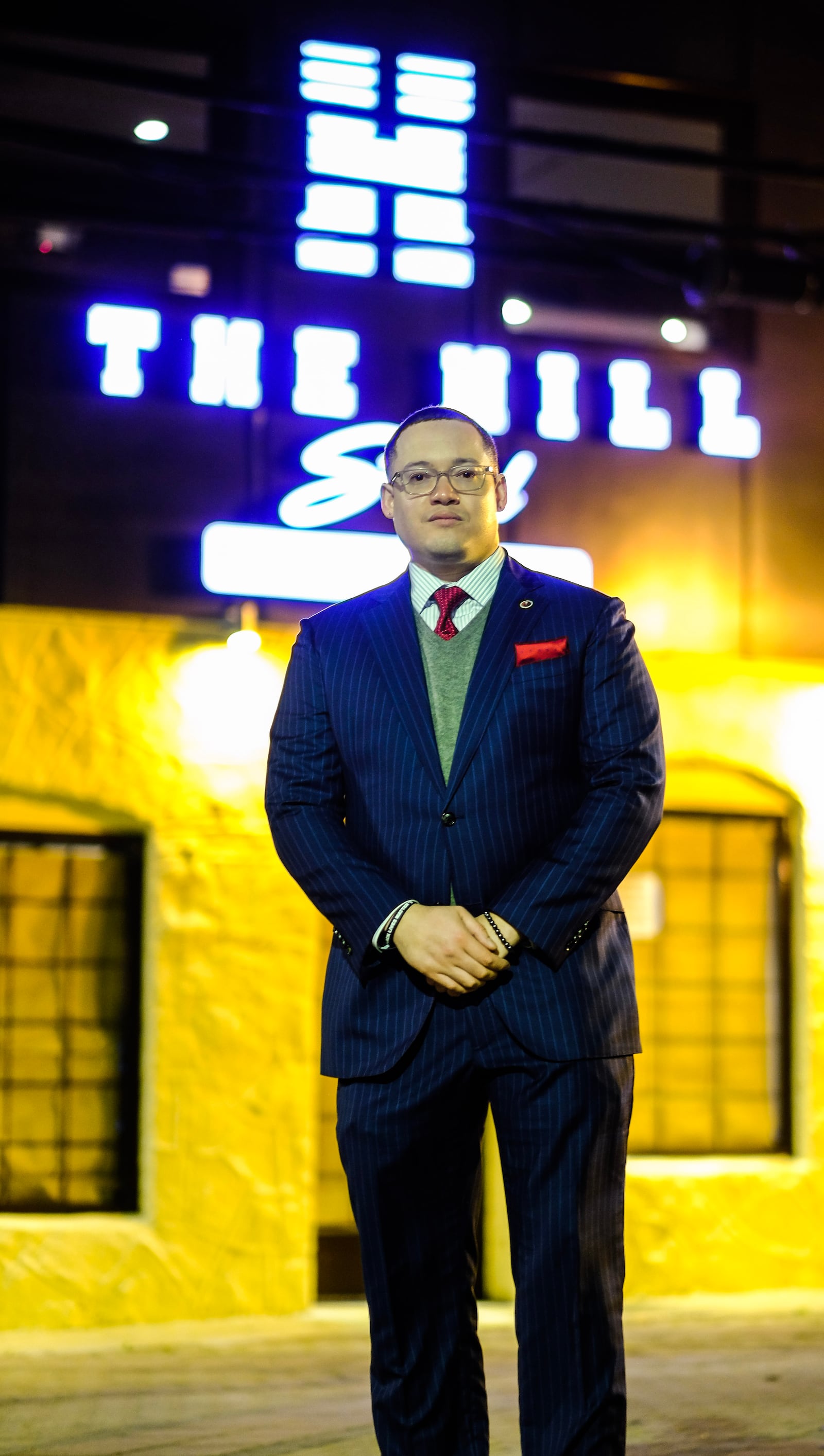 Charles Hill II in front of Hill Social.