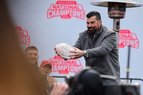 Ohio State head coach Ryan Day accepts the National Championship Coaches Trophy during the National Championship football celebration at Ohio Stadium in Columbus, Ohio, Sunday, Jan. 26, 2025. (AP Photo/Joe Maiorana)