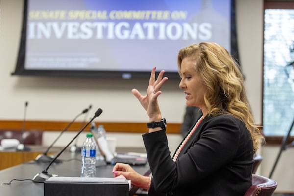 Defense attorney Ashleigh Merchant testifies before the Senate Special Committee on Investigation at the Georgia State Capitol on Wednesday, March 6, 2024. (Steve Schaefer/steve.schaefer@ajc.com)