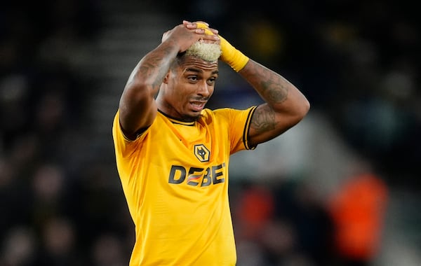 Wolverhampton Wanderers' Mario Lemina reacts to a misplaced pass, during the English Premier League soccer match between Wolverhampton Wanderers and Ipswich Town, at Molineux Stadium, in Wolverhampton, Saturday, Dec. 14, 2024. (Nick Potts/PA via AP)