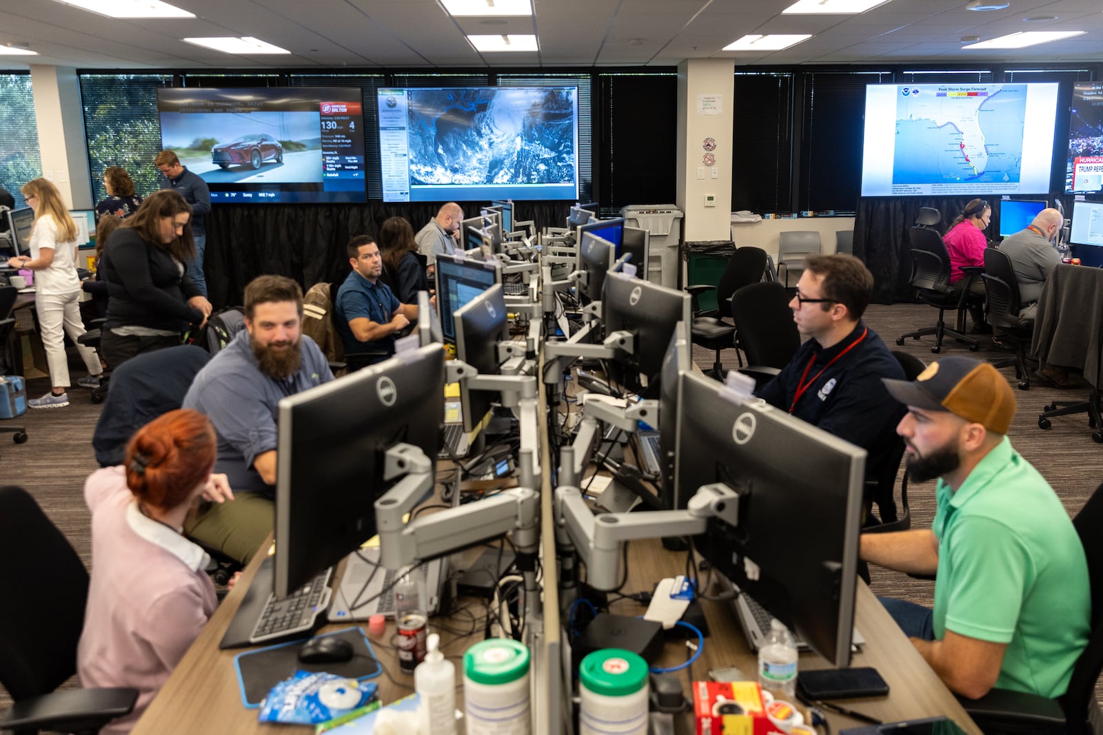 Federal Emergency Management Agency employees monitor Hurricane Milton, as well as coordinate recovery for hurricanes Helene and Debby, at the FEMA Regional Response Coordination Center in Atlanta on Wednesday, October 9, 2024. (Arvin Temkar / AJC)