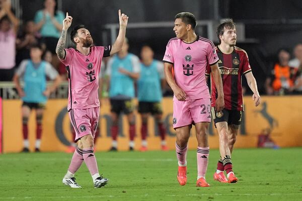 Inter Miami forward Lionel Messi (10) celebrates after scoring a goal during the second half of an MLS playoff opening round soccer match against Atlanta United, Saturday, Nov. 9, 2024, in Fort Lauderdale, Fla. (AP Photo/Rebecca Blackwell)