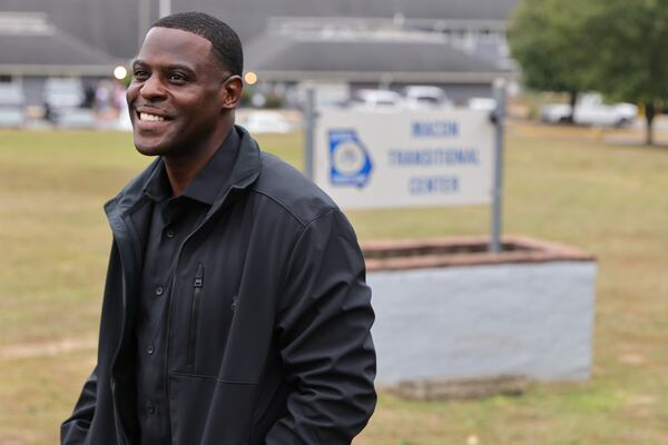 Michael “Little B” Lewis, stands outside of Macon Transitional Center where he was released after serving 27 years on Wednesday, September 27, 2023. Lewis was convicted of shooting and killing a father outside a convenience store when Lewis was 13 and was tried as an adult and sentenced to life in prison in 1997. (Natrice Miller/natrice.miller@ajc.com)