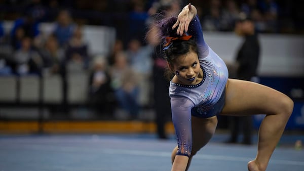 Auburn's Samantha Cerio performs a floor routine during an NCAA gymnastics meet against Kentucky, Friday, Feb. 1, 2019, in Lexington, KY. (AP Photo/Bryan Woolston)