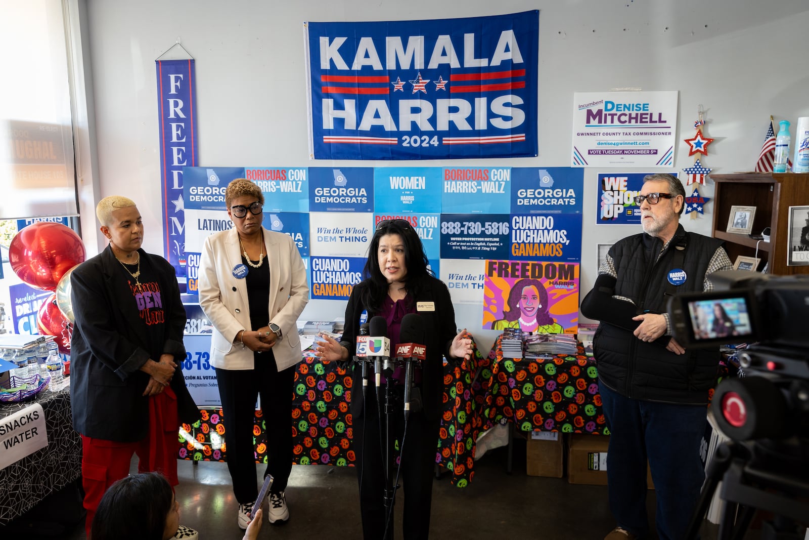 Elisa Covarrubias, deputy director of GALEO Latino Community Development Fund and the GALEO Impact Fund, speaks at a press conference at a Democratic campaign office in Norcross on Tuesday, October 29, 2024. Local Puerto Rican leaders were invited to speak after a comedian at a rally for Republican presidential candidate Donald Trump called Puerto Rico a “floating island of garbage.” (Arvin Temkar / AJC)