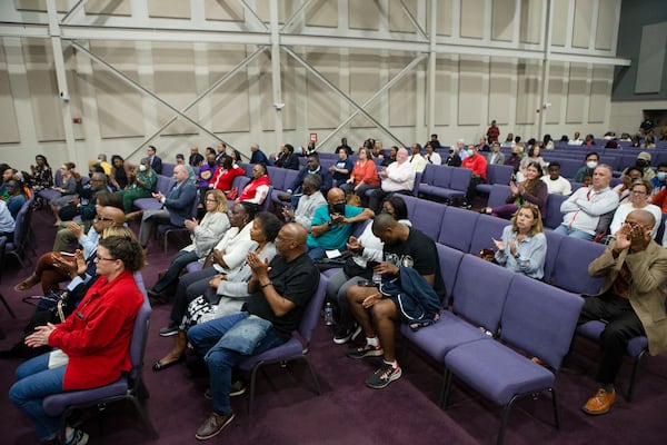 Attendees applaud during a panel discussion about violence and safety in Gwinnett County schools on Nov. 2, 2022, at New Mercies Church in Lilburn. Gwinnett County Public Schools has seen a streak of violence and safety issues, so district and community leaders met to discuss potential solutions. (Christina Matacotta for The Atlanta Journal-Constitution) 