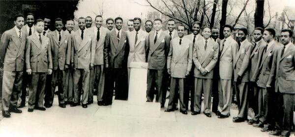 A group portrait of Andrew Young and his Alpha Phi Alpha fraternity brothers at Howard University circa 1950. Young (7th from right) became a member of the country's oldest Black fraternity in 1950. His dean of pledges was future New York City Mayor David Dinkins (first on left). From the book “The Many Lives of Andrew Young.” Copyright © 2022 by Ernie Suggs. Reprinted by permission of NewSouth Books. (Andrew Young Personal Collection)