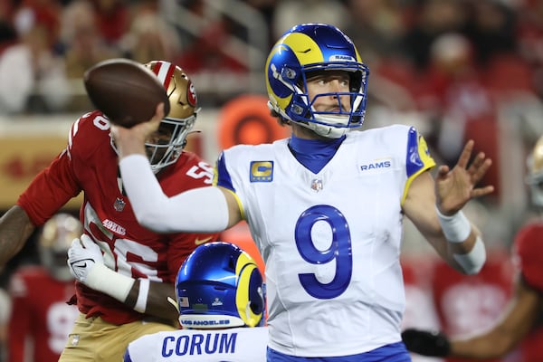 Los Angeles Rams quarterback Matthew Stafford (9) passes against the San Francisco 49ers during the first half of an NFL football game in Santa Clara, Calif., Thursday, Dec. 12, 2024. (AP Photo/Jed Jacobsohn)