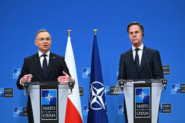 FILE - Poland's President Andrej Duda, left, and NATO Secretary General Mark Rutte address a media conference at NATO headquarters in Brussels, Thursday, March 6, 2025. (AP Photo/Harry Nakos, File)