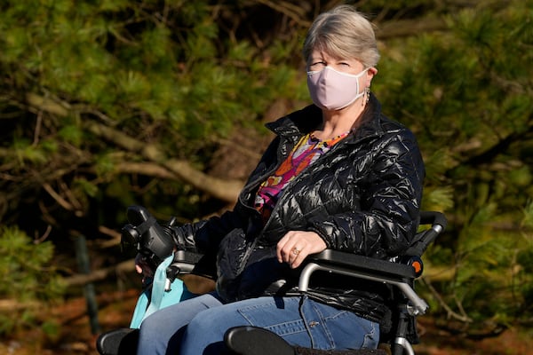 Bazia Zebrowski poses for a portrait outside her home Tuesday, Dec. 17, 2024, in Newbury, Ohio. (AP Photo/Sue Ogrocki)