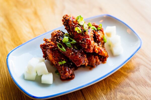 Korean Fried Chicken Wings are among the hot appetizers at Salaryman. CONTRIBUTED BY HENRI HOLLIS