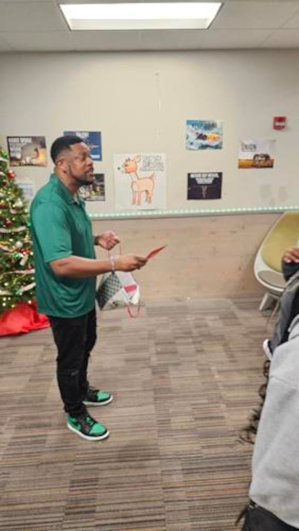 Atlanta actor and comedian Chris Tucker gave gifts to teens and staff at the A.R. Gus Barksdale Boys & Girls Club during a holiday event. (Handout)