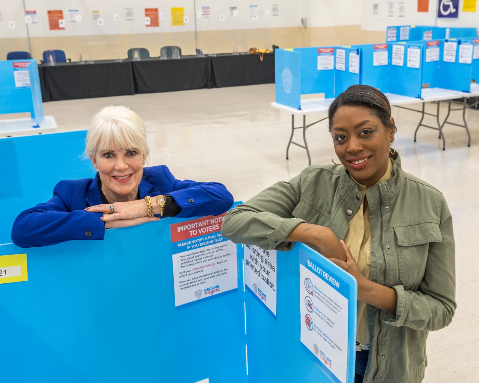 Nina Altschiller, left, and Chassidy Malloy are with the League of Women Voters of Coastal Georgia, which has fielded requests from voters seeking sample ballots and information on absentee voting and early polling locations since about Labor Day. “I’m completely burned out but also energized,” Altschiller said.