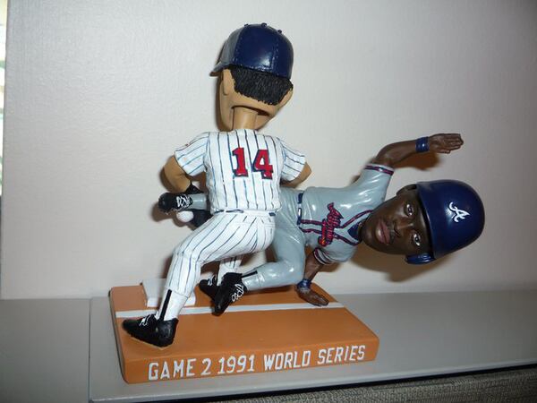 The Minnesota Twins will give away this doll at some point in the upcoming season. It commemorates one of the most controversial calls in World Series history, Twins first baseman Kent Hrbek lifting Ron Gant off first base during Game 2 of the 1991 World Series.