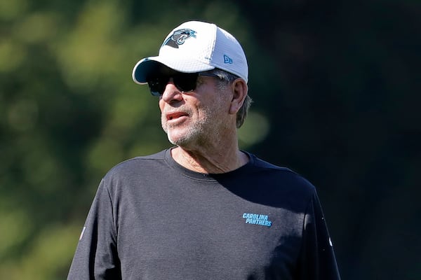 FILE - Carolina Panthers offensive coordinator Norv Turner directs the team during practice at the NFL football team's training camp in Spartanburg, S.C., July 29, 2019. (AP Photo/Chuck Burton, file)