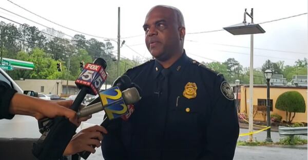 Deputy Chief Charles Hampton Jr. of the Atlanta Police Department briefs reporters on a deadly shooting involving two police officers that happened early Saturday morning at a gas station in southwest Atlanta.