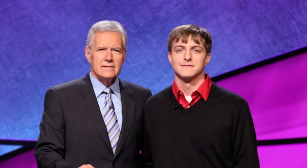 Andrew Moore with Alex Trebek. CREDIT: Jeopardy