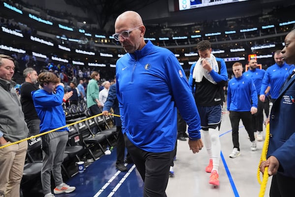 Dallas Mavericks head coach Jason Kidd, center, walks off the court after an NBA basketball game against the Sacramento Kings in Dallas, Monday, March 3, 2025. (AP Photo/Tony Gutierrez)