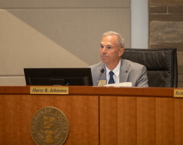 Cherokee County Commission Chairman Harry Johnston, listens to public comment ahead of the elections board appointments on Tuesday, June 4, 2024, in Canton, Georgia. (Jenni Girtman for The Atlanta Journal-Constitution)