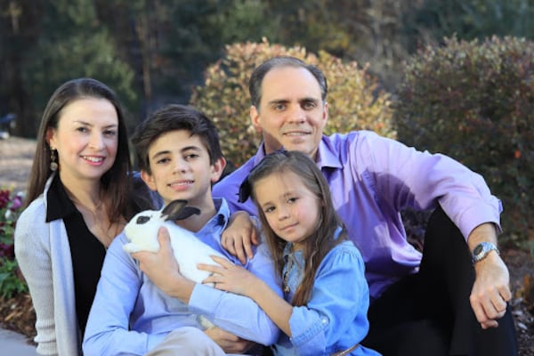 Claudia Yepes, her husband Patrick Opdenbosch, and their children Peter and Kathy, 2018