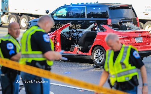 A school crossing guard was killed directing traffic in Cobb County.