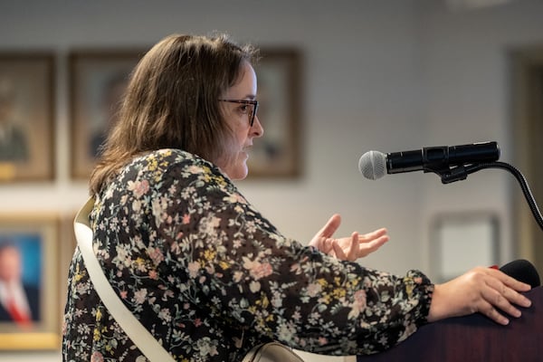 Kayla Sargent addresses the Marietta school board during its June 18, 2024, meeting. The board unanimously passed a ban on cellphones during the school day for middle school students. (Ben Hendren for The Atlanta Journal-Constitution)