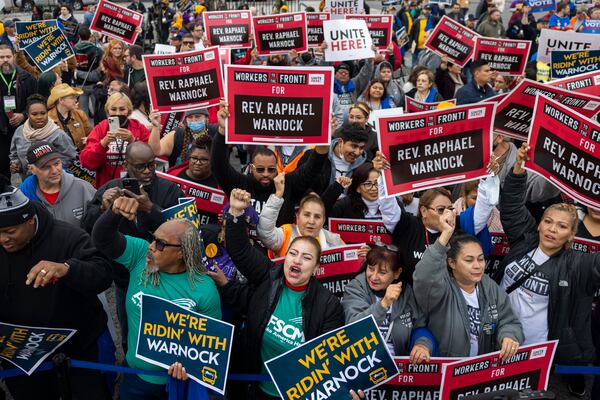 Supporters of U.S. Sen. Raphael Warnock cheer ahead of the candidate’s arrival at a Labor for Warnock rally in Atlanta on Saturday, Dec. 3, 2022. (Photos: Nathan Posner for The Atlanta Journal-Constitution)