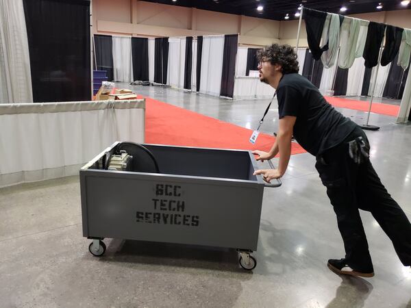 The cancellation of some events at Gwinnett’s Infinite Energy Center meant part-time technician Clay Smith was working his last shift for the foreseeable future. He was looking for other work options as the coronavirus oubreak scrambled metro Atlanta’s job picture. MATT KEMPNER / AJC