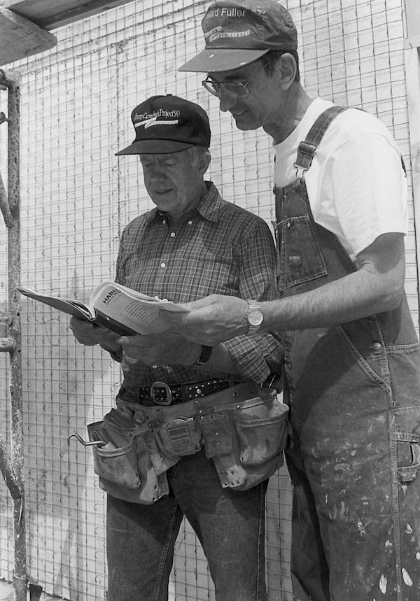 Former President Jimmy Carter (left) works with Habitat for Humanity co-founder Millard Fuller in Tijuana, Mexico, in 1990. (The Fuller Center for Housing)