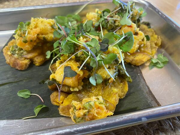 Seafood tostones at Belle & Lily's are two-bite flavor bombs. Ligaya Figueras/ligaya.figueras@ajc.com