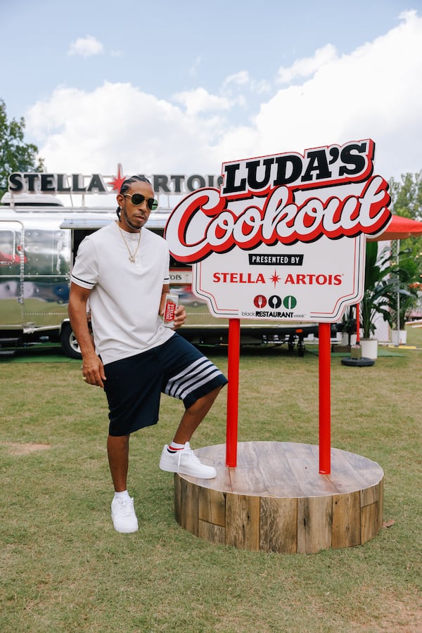 Ludacris poses in front of his event, Luda's Cookout, in partnership with Atlanta Black Restaurant Week, on August 14, 2024.