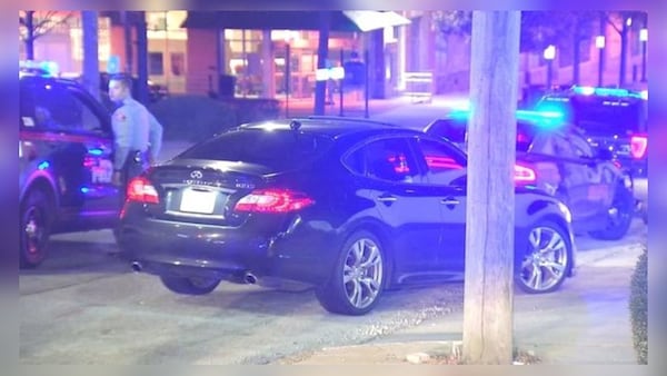 Atlanta police are investigating after a man pointed a gun at parking attendants before firing into the air. (Credit: Channel 2 Action News)