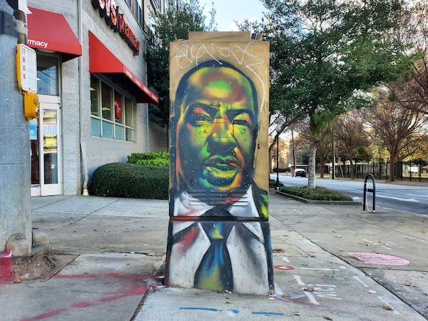 An Old Fourth Ward utility box painted by Fabian Williams.