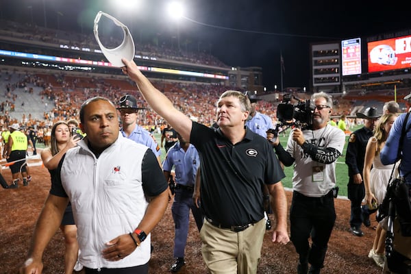 Georgia head coach Kirby Smart celebrates after their 30-15 win against Texas at Darrel K Royal Texas Memorial Stadium, Saturday, October 19, 2024, in Austin, Texas. Jason Getz/AJC

