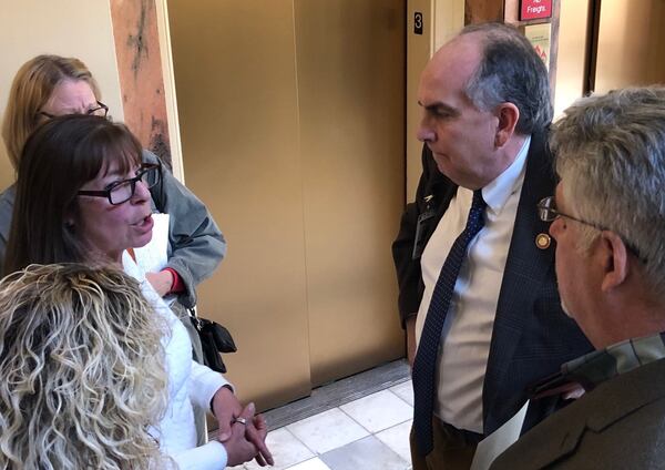 Jydon Carpenter, the alleged victim in a domestic violence case, was part of a group that went to the capitol earlier this month asking lawmakers to do something about House Speaker David Ralston’s numerous case delays in North Georgia courts. Here Carpenter speaks to Edward Lindsey, who co-chairs Ralston’s ad hoc committee examining the legislative leave law. 