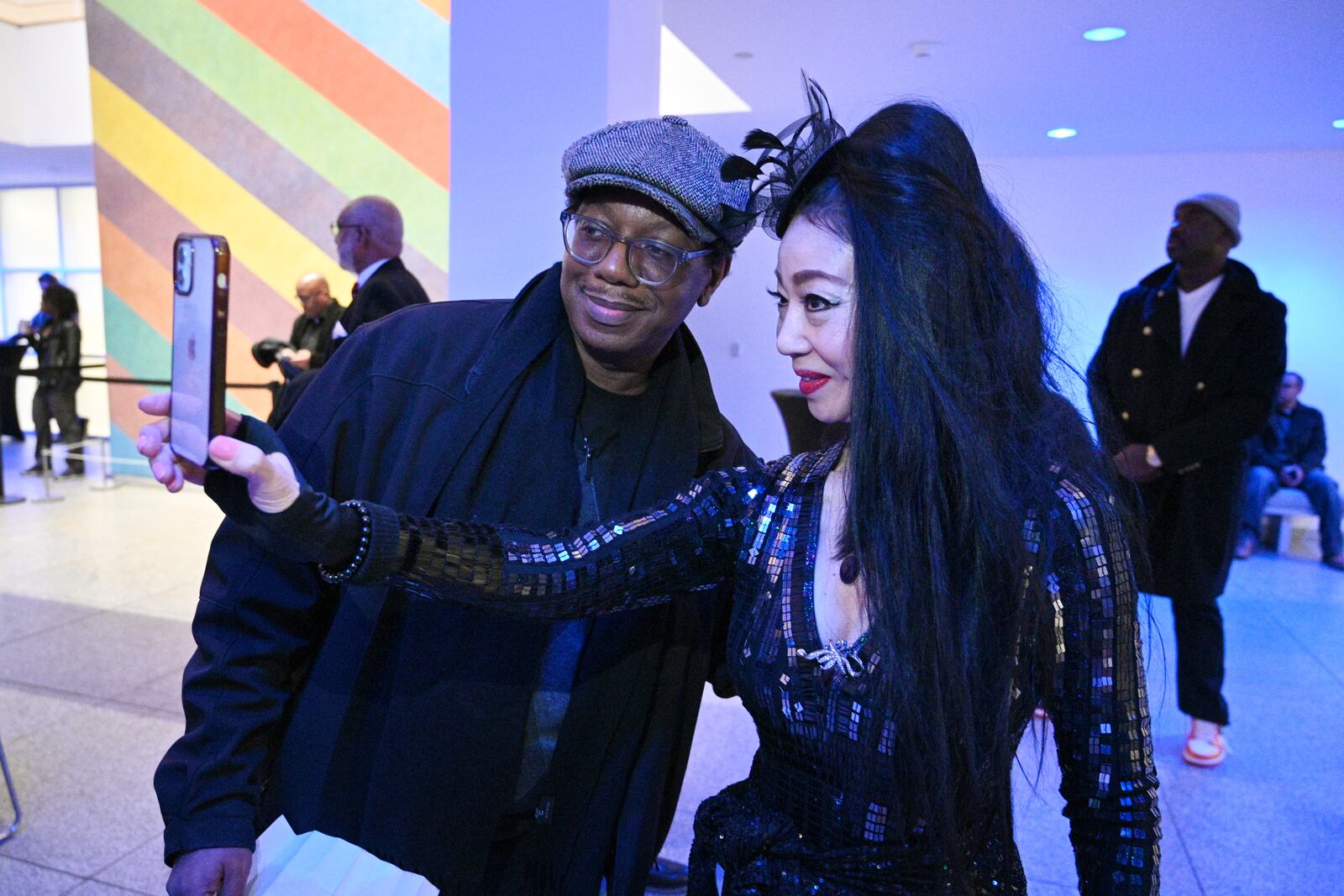 Jamal Ahmad, radio host on Jazz 91.9 WCLK, and jazz pianist Madoca Kawahara pose for a selfie before she performs during Friday Jazz series at High Museum of Art, Friday, January 19, 2024, in Atlanta. This story is about the 50th anniversary of WCLK. This story is about the 50th anniversary of WCLK. (Hyosub Shin / Hyosub.Shin@ajc.com)