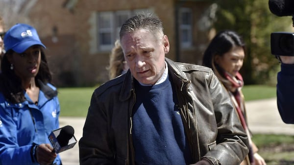 Andrew Freund Sr., 60, walks near his home on Dole Avenue in Crystal Lake, Ill., April 19, 2019, the day after reporting his 5-year-old son, Andrew “AJ” Freund, missing.