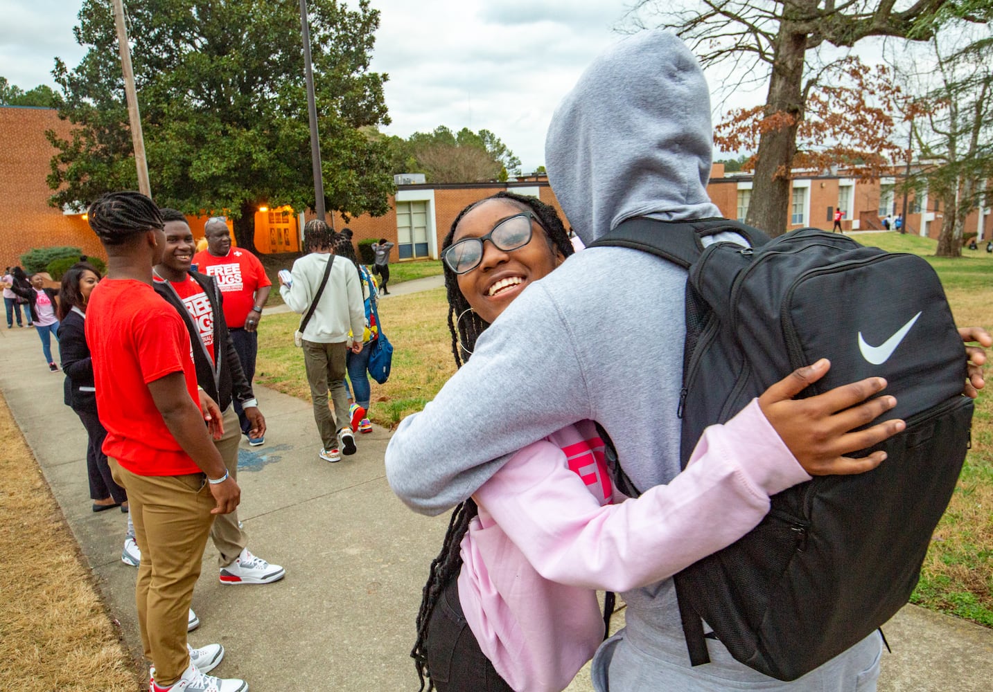 DeKalb County school hugs students every Wednesday on the way in to class