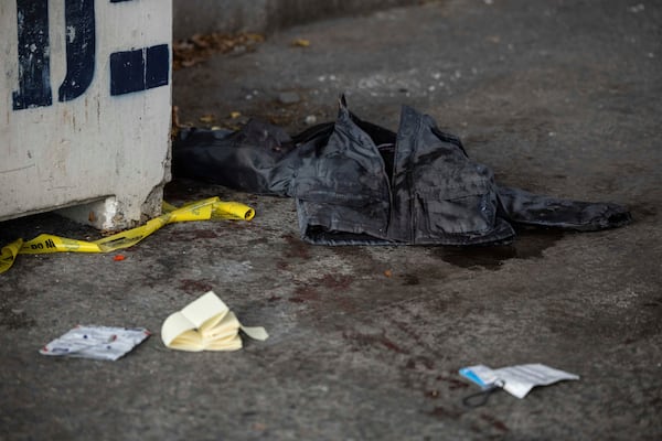 A jacket covered in blood lays on the ground at the site of a stabbing spree near the United Nations Headquarters, New York, Monday, Nov. 18, 2024. (AP Photo/Yuki Iwamura)