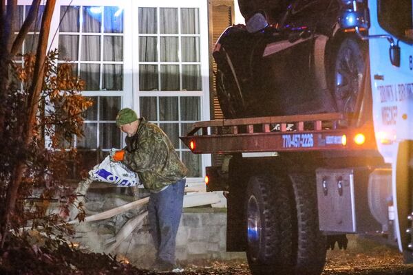 The driver of a Maserati was killed early Wednesday following a chase and crash. JOHN SPINK / JSPINK@AJC.COM