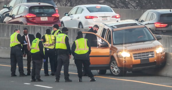 The eastbound lanes of I-20 were closed for more than three hours the morning of Feb. 25, 2021, after a man was found shot inside his vehicle in downtown Atlanta. Police discovered the body of a 33-year-old driver slumped in a wrecked orange Land Rover. (JOHN SPINK / John.Spink@ajc.com)