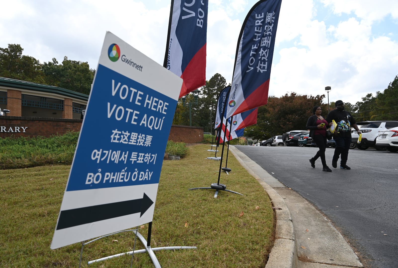 Gwinnett County voters cast their ballots Wednesday during early in-person voting at Five Forks Branch Library in Lawrenceville. Hyosub Shin/AJC