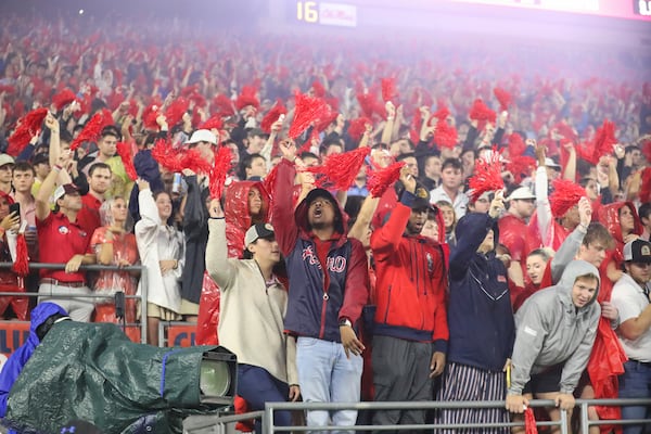 Ole Miss fans cheer during the second half of an NCAA college football game against Georgia on Saturday, Nov. 9, 2024, in Oxford, Miss. Mississippi won 28-10. (AP Photo/Randy J. Williams)