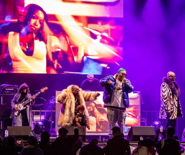 The Peach Drop returns to Underground Atlanta with a free concert including Big Boi as the headliner on Tuesday, Dec 31, 2024.  Big Boi, second from left, is on stage with his grandson, Killer Mike and Sleepy Brown. (Jenni Girtman for The Atlanta Journal-Constitution)